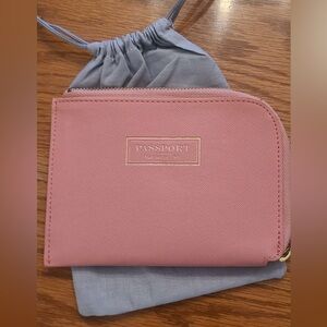Elegant pink leather passport holder with zipper